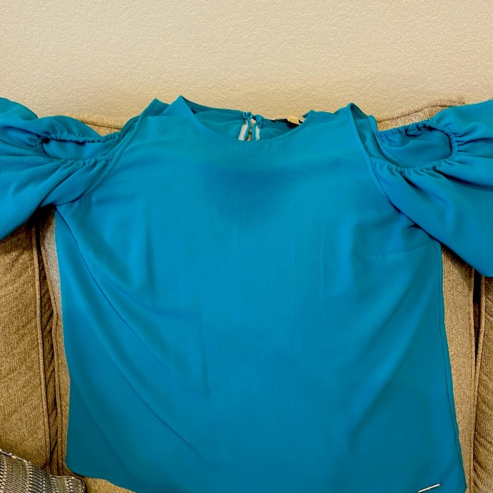 Michael Kohrs cold shoulder blouse. More of a teal color.